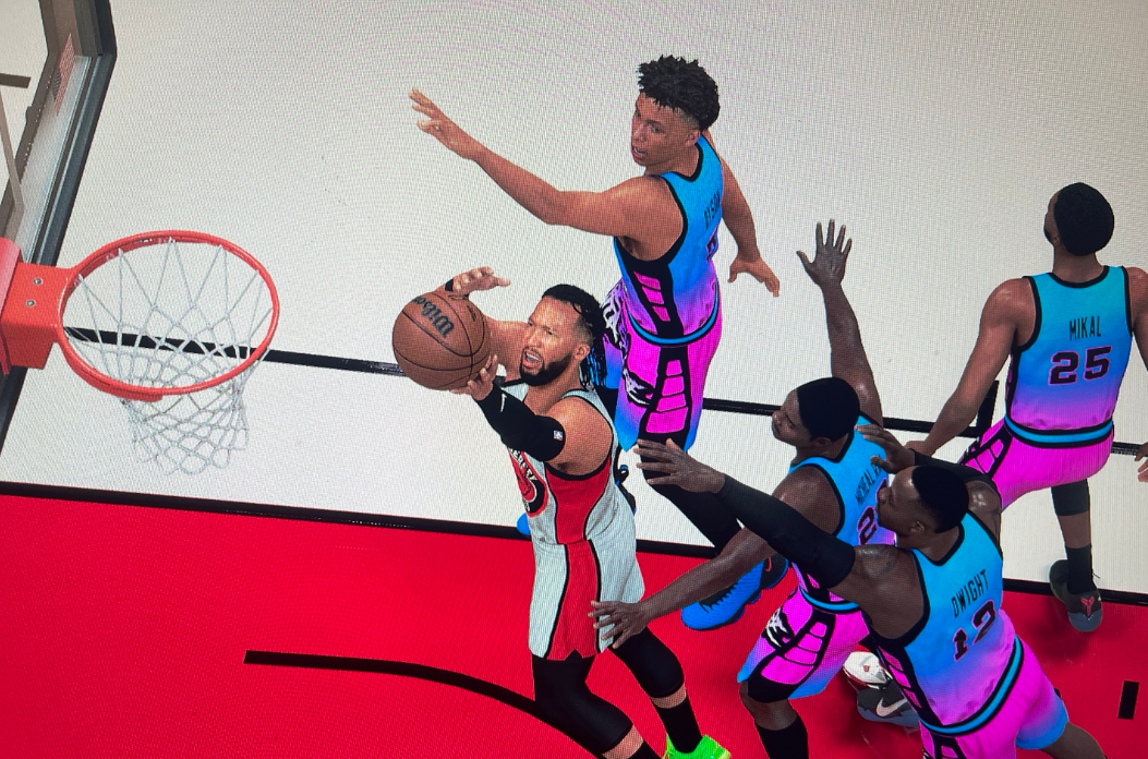 Jalen Brunson attacks the rim through four Newark Riots defenders on the decisive late layup